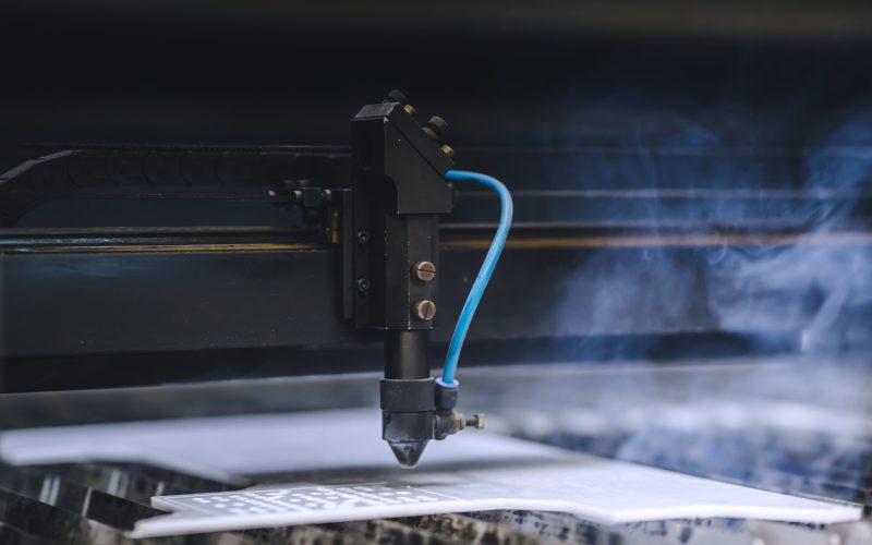 Automated self working laser cutting machine during progress. Automated self working laser cutting machine during progress.